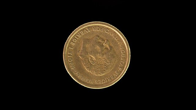 Sweden 1991 10 kronor coin obverse featuring portrait of King Carl XVI Gustaf rotating on black background