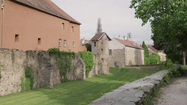 Historic stone walls and buildings in European old town