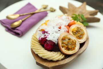 Different fresh fruits on white table, closeup