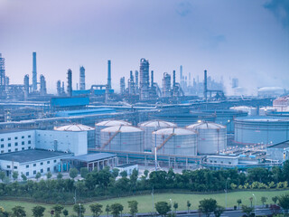 oil refining plant during sunset