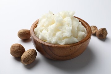 Natural shea butter on white background, closeup
