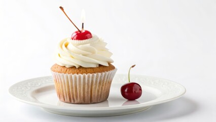 Delicious Vanilla Cupcake with Cherry Topping Awaits Enjoyment on Elegant Plate