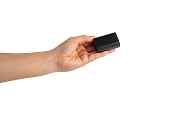 Black DSLR camera battery and hand on transparent background