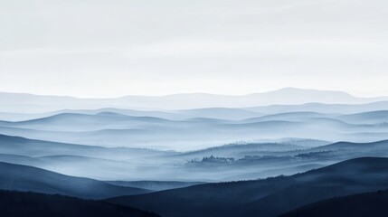 Obraz premium Serene landscape with overlapping mountain ranges shrouded in soft, atmospheric haze