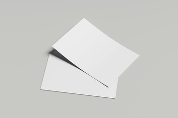 Blank paper brochure on grey background