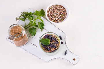 Healthy eating, lifestyle, veganism, alkaline diet, vegetarian concept. Green smoothies from nettle...