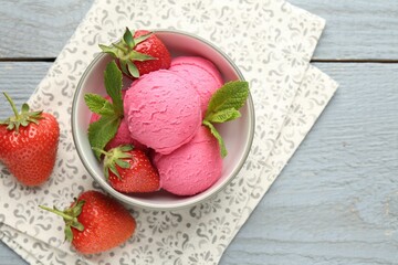Tasty sorbet with strawberries and mint served on grey wooden table, flat lay. Space for text
