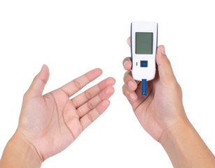 A person is using a blood glucose meter to check their blood sugar level on their fingertip against a black background.