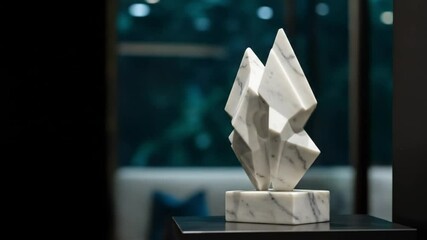 Abstract marble sculpture on dark table - Powered by Adobe
