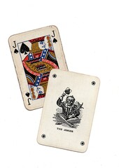 A hand of vintage playing cards showing a joker and one other isolated on a white background.