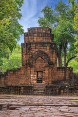 Khmer architecture of Mueang Sing castle in Kanchanaburi Thailand with stone structure and forest background