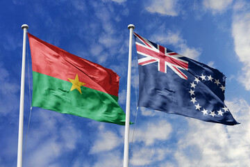 A Burkina Faso and Tuvalu flag, a metaphor for Pacific-African bonds, wave together against a blue...