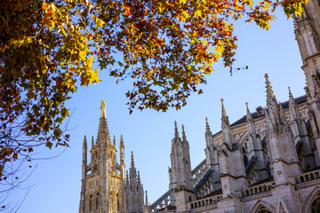 The Tour Pey Berland, featuring a golden Virgin Mary statue, stands beside the Cathédrale...