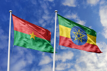 A Burkina Faso and Ethiopia flag, a metaphor for East African solidarity, wave together against a blue sky, symbolizing friendship and cultural heritage.