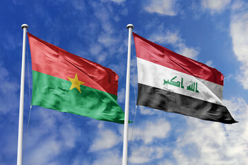 Flags of Burkina Faso and Iraq Waving Together Against a Blue Sky, Symbolizing Diplomatic Relations and Intercontinental Partnership
