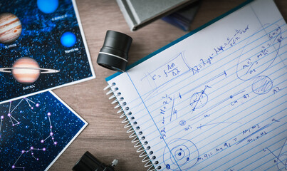 Student notebook with notes for study of astronomical physics