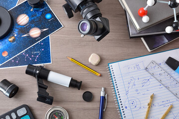 Astronomy student workspace with bench with items for astronomical study
