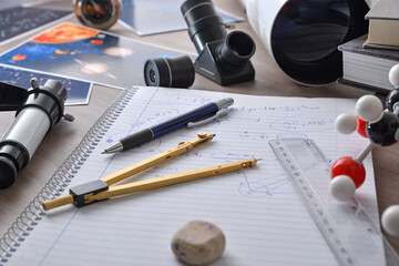 Astronomy student workspace with bench with study material elevated view