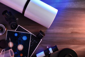 Detail of a telescope and parts for exploration on table