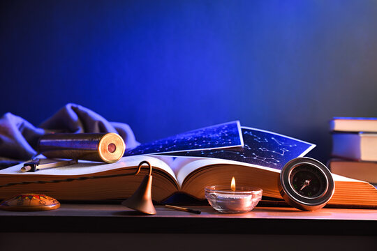 Concept of exploring planets and constellations objects on table