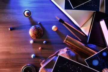 Astronomy exploration concept with table with retro objects