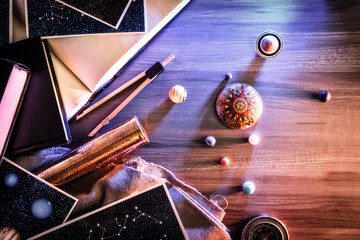 Concept of exploring stars and constellations with table retro objects