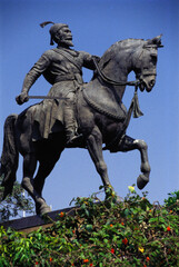 Fototapeta premium Statue of Shivaji Maharaj ride on horse at Gateway Of India, Bombay Mumbai, Maharashtra, India