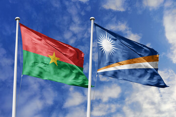 A Burkina Faso and Marshall Islands flag, a metaphor for Pacific-African unity, wave together against a blue sky, symbolizing friendship and cultural exchange.