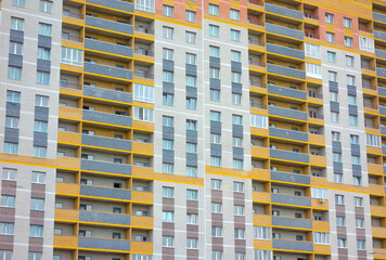 Close-up, facade finishing of a new building, construction of a new multi-storey building