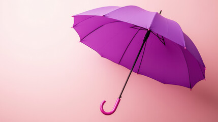 Purple umbrella floating on light pink background with curved handle, creating bright and cheerful atmosphere