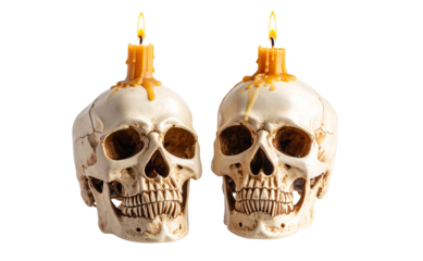 Two Human Skull with Candle on Top, Melting Wax Dripping, isolated on a transparent background