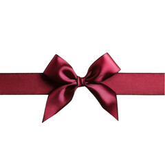 A deep maroon satin ribbon tied in a large, elegant bow against a black background