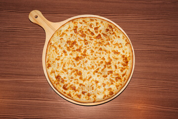 cheese pizza on wooden background