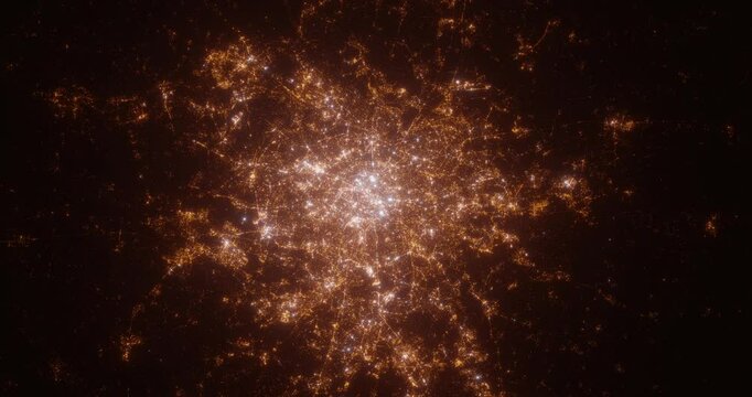 Paris (France) aerial view at night. Top view on modern city with street lights. Camera is flying above the city, moving backward