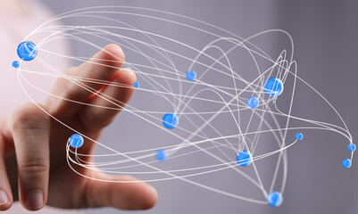 Abstract image of a hand interacting with a network of digital nodes, representing global...