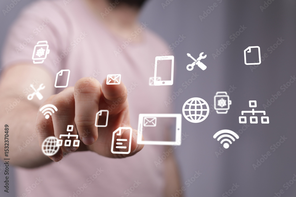 Poster Close-up of a person interacting with a digital interface displaying various application icons.