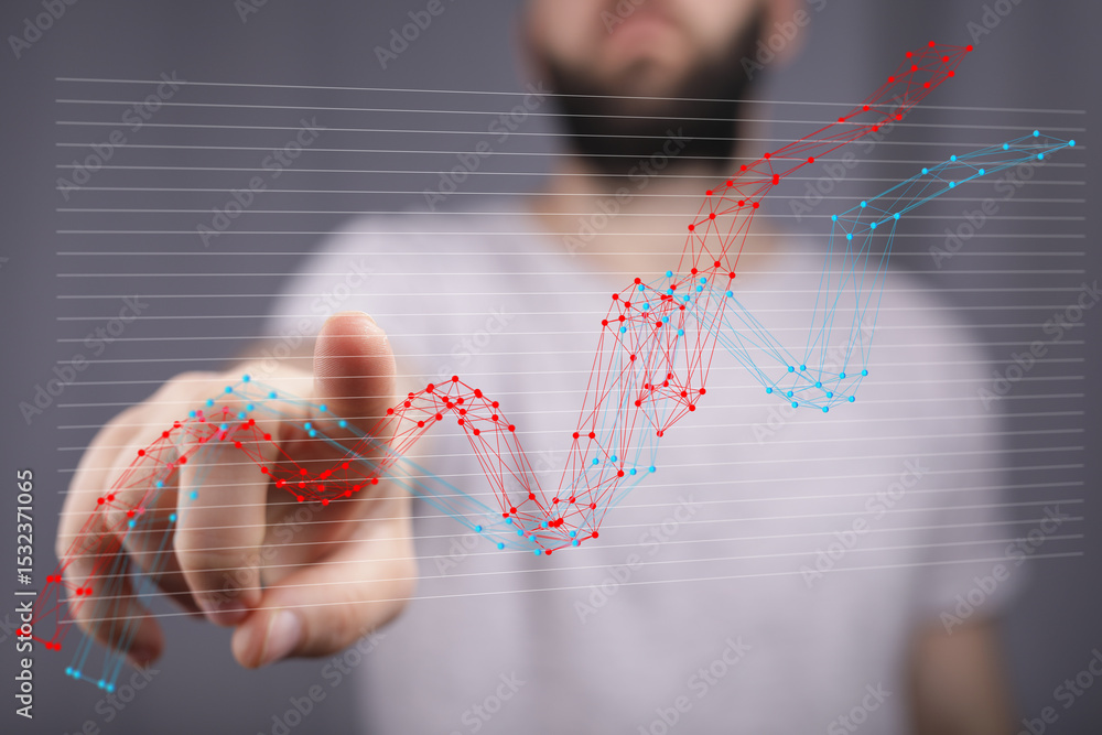 Aufkleber Stock photo of a man interacting with a dynamic data chart, showcasing growth and analysis.