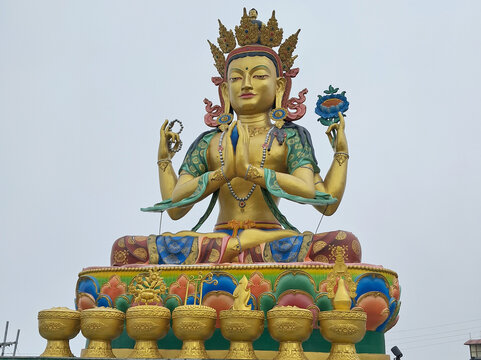 A 35 ft tall golden statue of Buddhist saint Avalokiteshvara (Chenrezig) at Chittray near Tumling in Darjeeling. He is the deity among the tenth-level Bodhisattvas associated with great compassion.