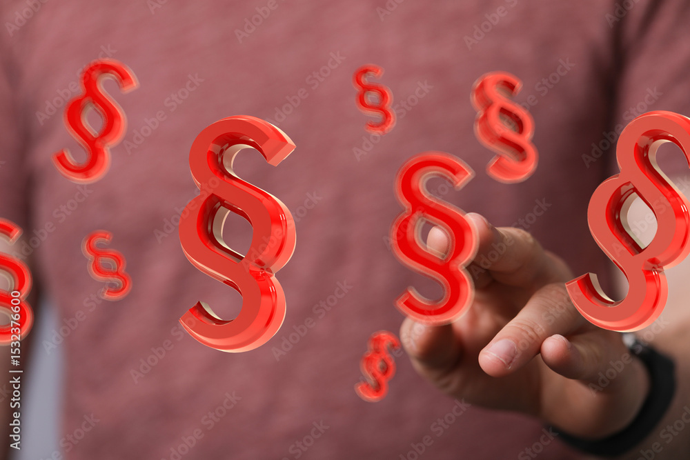 Poster Abstract image of red paragraph symbols floating above a hand, symbolizing legal concepts and digital law.