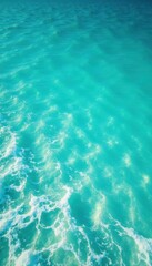Crystal clear turquoise ocean, white wave foam , calm, surf