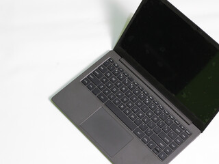 Laptop with black screen. Looks elegant on white grounds.