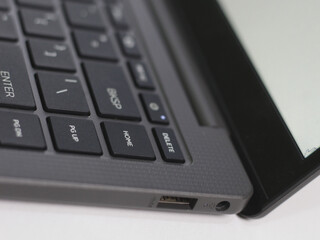 Several buttons on the laptop and USB socket.