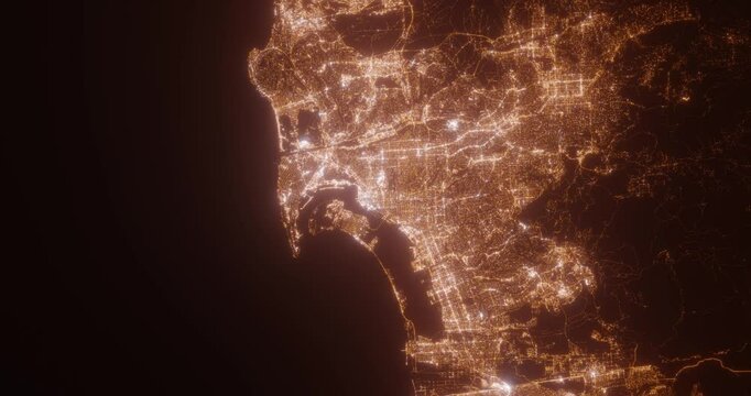 San Diego (California, USA) aerial view at night. View on modern city from space. Camera is zooming in, rotating counterclockwise