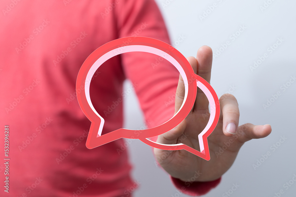 Poster image of a person holding two red speech bubbles, perfect for communication concepts.