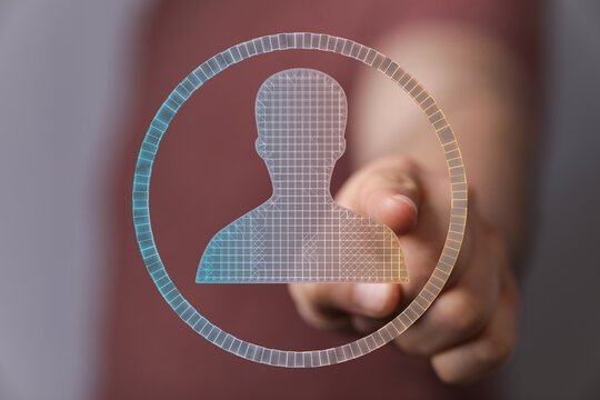 Person clicks digital profile icon.  Concepts: online identity, account, user profile, digital selection.