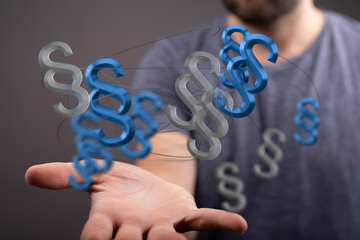 Abstract image of legal paragraph symbols hovering above a hand. Perfect for law, justice, or legal...