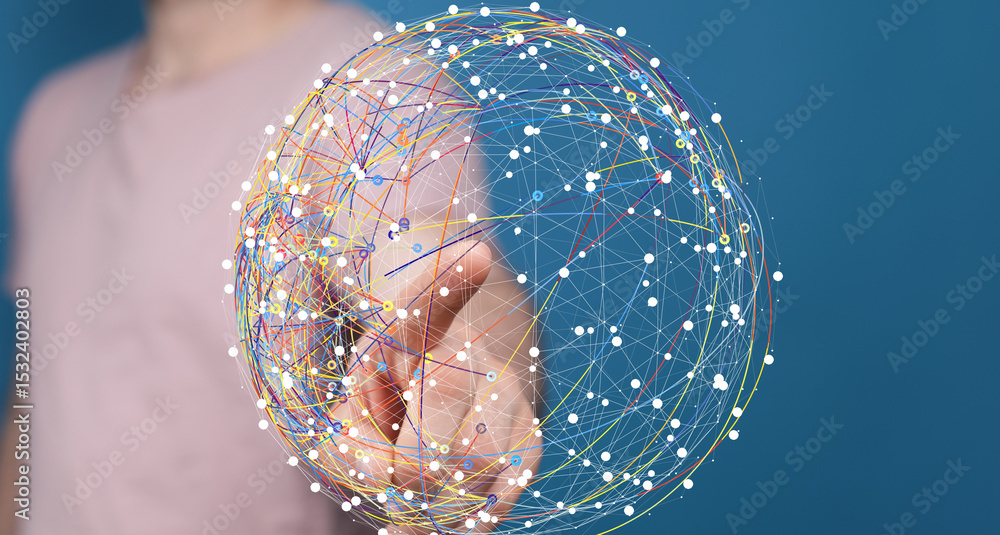 Aufkleber person interacts with a digital sphere, representing global networks and connections.
