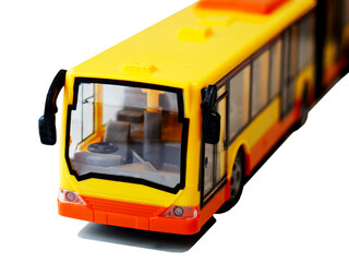 Toy yellow accordion bus on a white background.