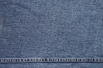 Jeans pants. A detailed stitching details of a blue denim jean.