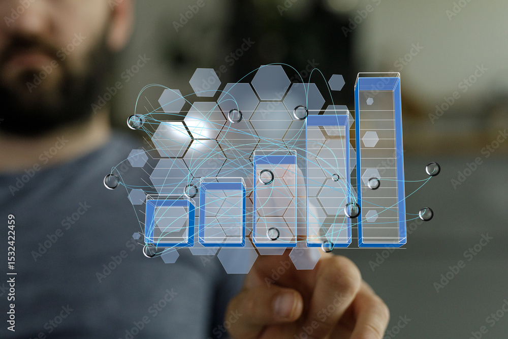 Poster stock photo of a businessman interacting with a digital interface showing upward trending bar graph.